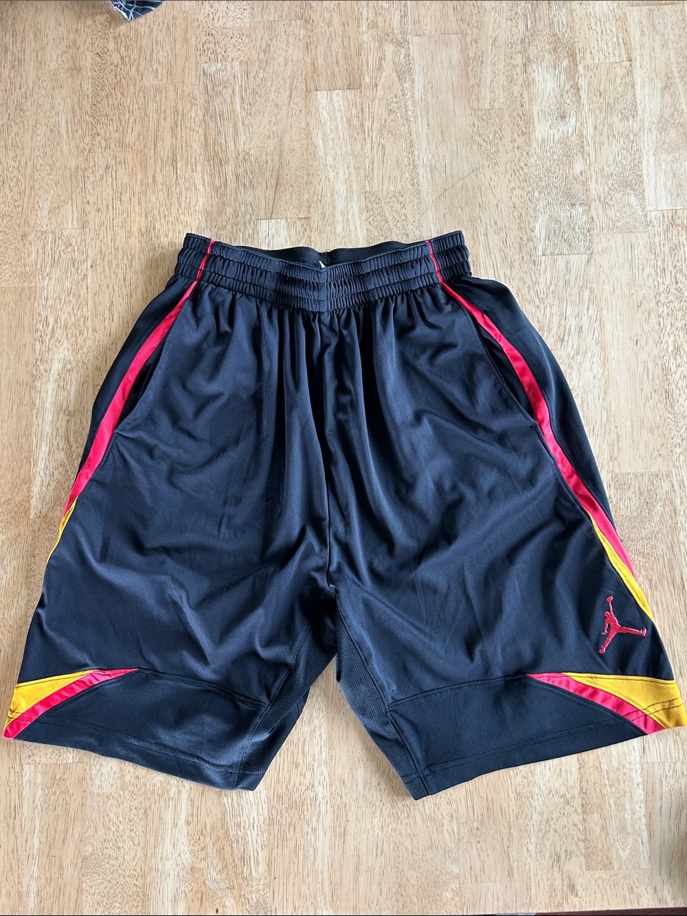 Jordan Black Athletic Shorts with Red & Yellow Trim